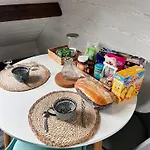 Couette-café Les Palmiers 4*